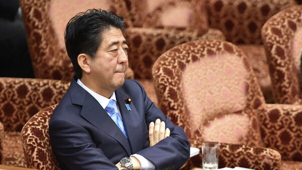 Japan's Prime Minister Shinzo Abe attends an upper house special committee session at the parliament in Tokyo on July 28, 2015. - Sputnik International