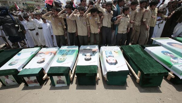 In this Aug. 13, 2018, file photo, Yemeni people attend the funeral of victims of a Saudi-led airstrike, in Saada, Yemen - Sputnik International