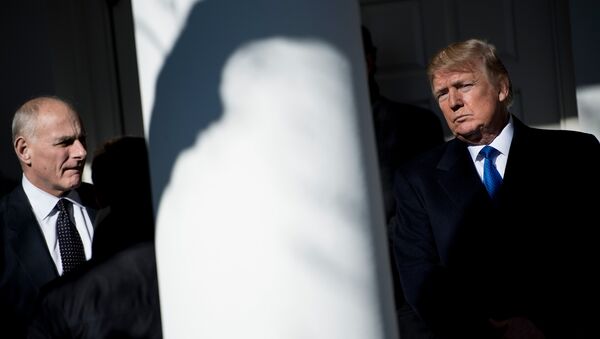 In this file photo taken on January 19, 2018 White House Chief of Staff John Kelly (L) waits for US President Donald Trump (R)to speak live via video link to the annual March for Life participants and anti-abortion leaders, from the White House in Washington,DC - Sputnik International