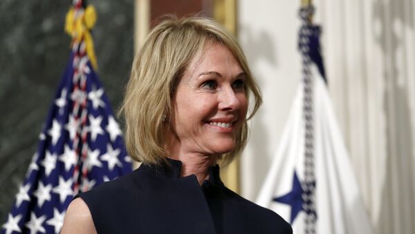 U.S. Ambassador to Canada Kelly Knight Craft stands during her swearing in ceremony in the Indian Treaty Room in the Eisenhower Executive Office Building on the White House grounds, Tuesday, Sept. 26, 2017, in Washington. - Sputnik International