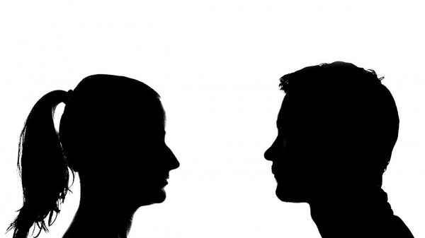Female and male silhouettes - Sputnik International