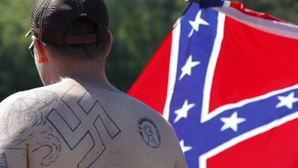 supporters of the US Confederate flag, expecting the Ku Klux Klan to show up, participate in a rally in Georgia - Sputnik International