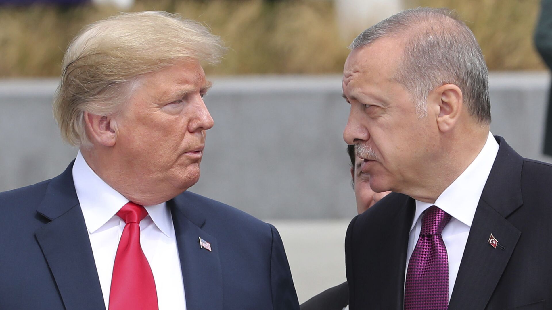 U.S. President Donald Trump, left, talks to Turkish President Recep Tayyip Erdogan, right, as they tour the new NATO headquarters in Brussels, Belgium, Wednesday, July 11, 2018. NATO countries' heads of states and governments gather in Brussels for a two-day meeting. U.S. President Donald Trump, left, talks to Turkish President Recep Tayyip Erdogan, right, as they tour the new NATO headquarters in Brussels, Belgium, Wednesday, July 11, 2018. NATO countries' heads of states and governments gather in Brussels for a two-day meeting. - Sputnik International, 1920, 05.10.2021