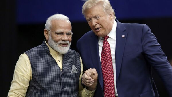 President Donald Trump shakes hands with Indian Prime Minister Narendra Modi during the Howdy Modi: Shared Dreams, Bright Futures event at NRG Stadium, Sunday, Sept. 22, 2019, in Houston - Sputnik International