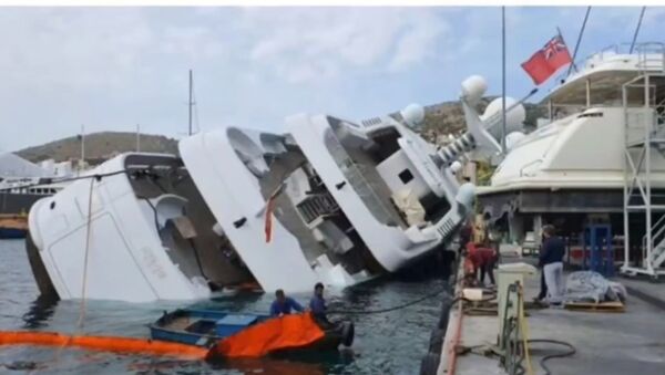 The $78 million luxury superyacht belonging to Saudi Prince Turki bin Mohamed bin Fahd Al Saud submerged underwater in Perama, Greece.  - Sputnik International