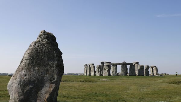 Security guards patrol the prehistoric monument at Stonehenge in southern England, on April 26, 2020, closed during the national lockdown due to the novel coronavirus COVID-19 pandemic - Sputnik International