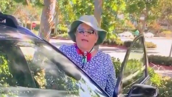 A Torrance, California, resident is caught on two videos initiating threatening, racially-charged verbal attacks against Asian parkgoers. - Sputnik International